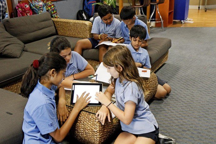 Students Engaged in Collaborative Learning - Photo